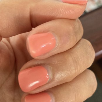 Luxury Nails & Spa - Notice bubbling on thumb and odd shaping/bubbling on middle finger. One week after gel manicure. - Nail Salons Near Me - Palm Desert, California