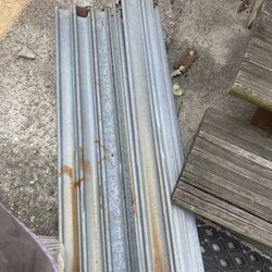 Full of Crap Junk Removal - Heavy folded galvanized metal debri from my yard