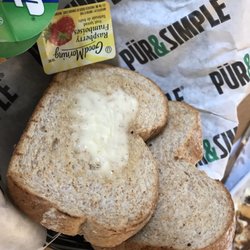 Cold , untoasted soggy overbuttered bread they call " toast"