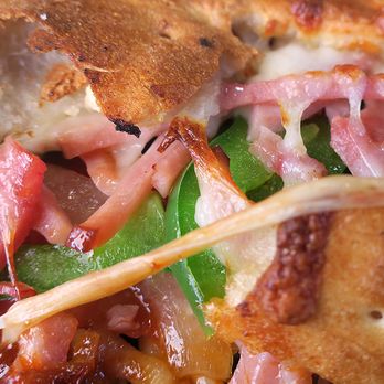 Pizza Factory - Calzone stuffed with yummy filling. - Pizza Near Me - Fallon, Nevada