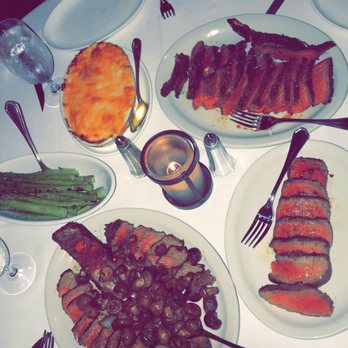 Buffalo Chophouse - Family dinner - 12 oz Filet Mignon, 40 oz porterhouse, 32 oz rib eye, Au Gratin potatoes, grilled asparagus - Steakhouses Near Me - Buffalo, New York Buffalo Chophouse - Family dinner - 12 oz Filet Mignon, 40 oz porterhouse, 32 oz rib eye, Au Gratin potatoes, grilled asparagus - Steakhouses Near Me - Buffalo, New York