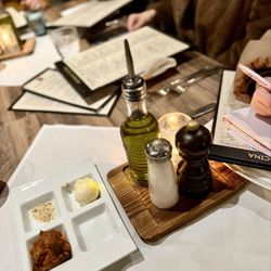 Nonna's Citi Cucina - House bread with eggplant, butter, oil and herbs to start