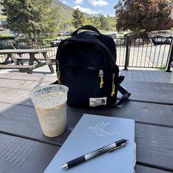 Alpha Coffee - Cottonwood Heights - Outside seating area drinking the Viking iced latte