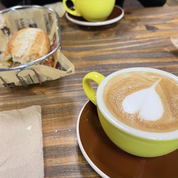 Macondo Coffee Roasters - Cappuccino Coffee and Mamma Mia Sandwich - Coffee & Tea Near Me - Doral, Florida Macondo Coffee Roasters - Cappuccino Coffee and Mamma Mia Sandwich - Coffee & Tea Near Me - Doral, Florida