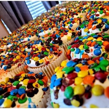 Big Ants Bakery - a table of cupcakes - Desserts Near Me
