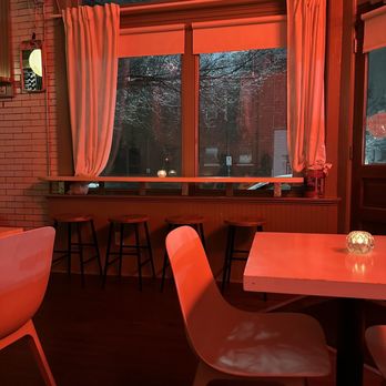 'ssippi -  a table and chairs in a restaurant - Wine Bars Near Me - St. Louis, Missouri