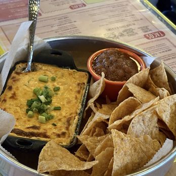 Honcho Fuego - Queso and red/house salsa on the side - Latin American Near Me - Fenton, Michigan Honcho Fuego - Queso and red/house salsa on the side - Latin American Near Me - Fenton, Michigan