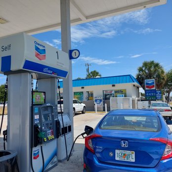 Cocoa Beach Chevron - a blue car at a gas station - Gas Stations Near Me - Cocoa Beach, Florida Cocoa Beach Chevron - a blue car at a gas station - Gas Stations Near Me - Cocoa Beach, Florida