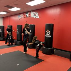 Freedom Martial Arts - Tigers learning the side kick.