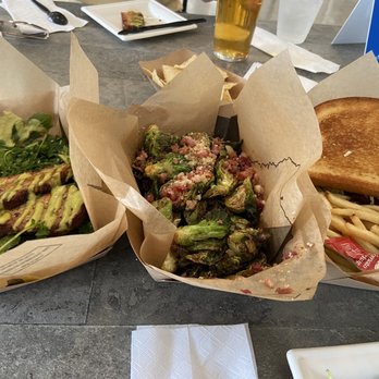 Fitzhugh Brewing - Pork belly, Brussels, hot chicken sandwich. - Breweries Near Me - Dripping Springs, Texas Fitzhugh Brewing - Pork belly, Brussels, hot chicken sandwich. - Breweries Near Me - Dripping Springs, Texas