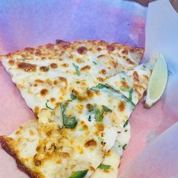 Sliver Pizzeria - Slice of the Corn, Chile Pasilla, Yellow Onions, Mozzarella, French Feta Cheese, Cilantro, Garlic Olive Oil, and Lime pizza! - Pizza Near Me - Berkeley, California Sliver Pizzeria - Slice of the Corn, Chile Pasilla, Yellow Onions, Mozzarella, French Feta Cheese, Cilantro, Garlic Olive Oil, and Lime pizza! - Pizza Near Me - Berkeley, California