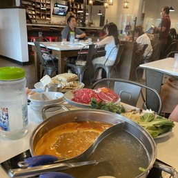 Family Style Shabu Shabu and Tom Yum Hot Pot with fillings to put in
