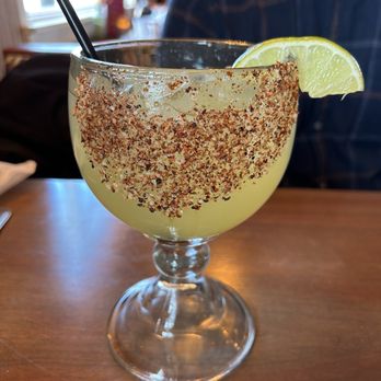 Tia Carmen - Margarita. A little strange to have the salt/seasoning on one side of the glass. Felt like just licking the glass too much! - Mexican Near Me - Geneva, Illinois