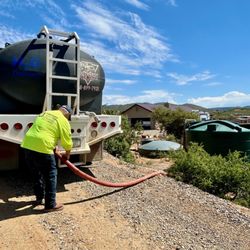 Southwest Water Truck - Filling multiple residential water storage tanks