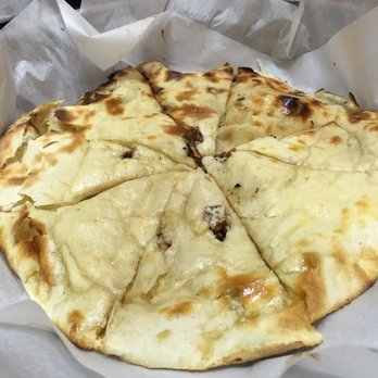 Rasika - Naan with chocolate and almonds. - Indian Near Me - Washington, DC, District of Columbia