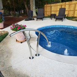 Charlotte Fiberglass Pools & Spas - Rail is installed away from steps instead of to the side.