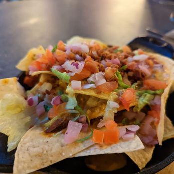 Nacho Daddy - a plate of nachos on a table - Mexican Near Me - Henderson, Nevada Nacho Daddy - a plate of nachos on a table - Mexican Near Me - Henderson, Nevada