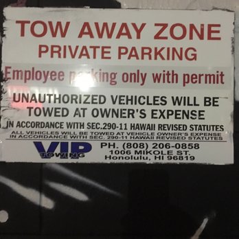 VIP Towing - sign that is hardly visible - Towing Near Me - Honolulu, Hawaii