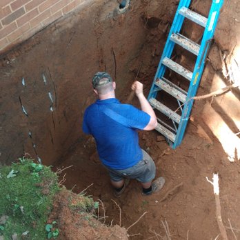 Basement Technologies of Western NC - Getting down in there - Waterproofing Near Me