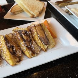 Nutella Stuffed French Toast with NUTELLA® toast, Sausage ,and cheese grits Nutella Stuffed French Toast with NUTELLA® toast, Sausage ,and cheese grits