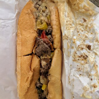 Tat's Delicatessen - Finally tried Tat's! Here's an 8-inch cheesesteak with American cheese and all the toppings - Delis Near Me - Seattle, Washington Tat's Delicatessen - Finally tried Tat's! Here's an 8-inch cheesesteak with American cheese and all the toppings - Delis Near Me - Seattle, Washington