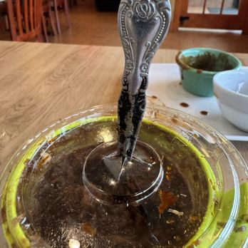 Pho Saigon - This is how they serve chili oil, spoon hasn't seen water in quite a while. - Vietnamese Near Me - Manassas, Virginia