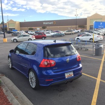 Walmart Supercenter - a blue car parked in a parking lot - Department Stores Near Me - Lancaster, South Carolina