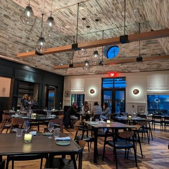 January - a dining room with tables and chairs - New American Near Me - Franklin, Tennessee