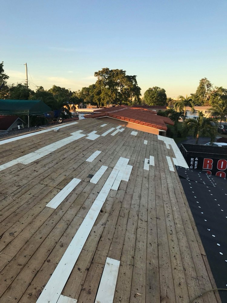 Slide of Rocky's Roofing