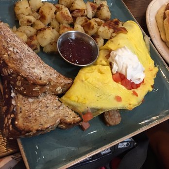 First Watch - The works omelet for my mom. she wasn't a fan of the bread and the jelly/butter - Breakfast & Brunch Near Me - Sarasota, Florida