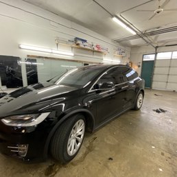 Model X Tesla -- I got the tints right below Limo tints. 18% I think?