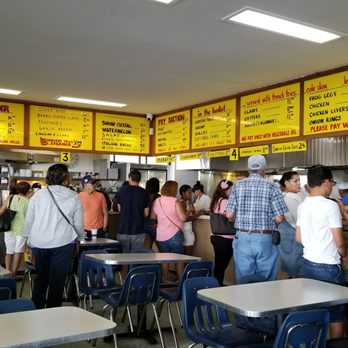 Johnny's Reef Restaurant - Indoor eating space with menu on top - Seafood Near Me - Bronx, New York Johnny's Reef Restaurant - Indoor eating space with menu on top - Seafood Near Me - Bronx, New York