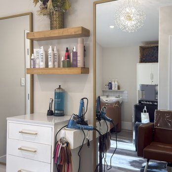 Jane Michael Hair Studio - Modern styling station at Jane Michael Hair Studio in Menifee, CA, featuring premium haircare, gold mirrors and a warm, inviting feel. - Eyebrow Services Near Me - Menifee, California Jane Michael Hair Studio - Modern styling station at Jane Michael Hair Studio in Menifee, CA, featuring premium haircare, gold mirrors and a warm, inviting feel. - Eyebrow Services Near Me - Menifee, California