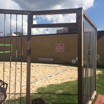 The Irish Pub - a volleyball court in the back yard - Irish Pub Near Me - Greenville, South Carolina