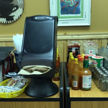 Swamp Cafe - Condiments area - nice variety of hot sauces - Cajun/Creole Near Me - Dallas, Texas