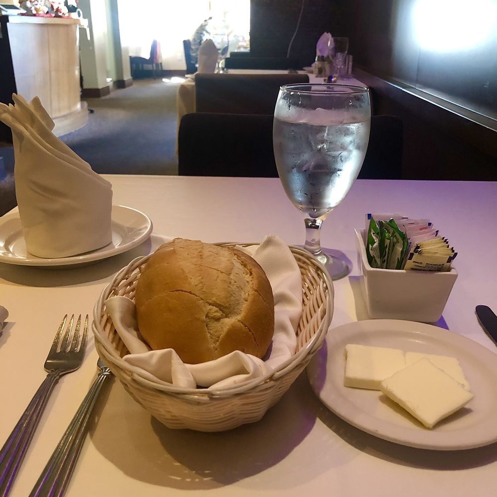 Assaggio Bistro - Mr Bread, Mr Ice Water await the food - Italian Near Me - Honolulu, Hawaii Assaggio Bistro - Mr Bread, Mr Ice Water await the food - Italian Near Me - Honolulu, Hawaii