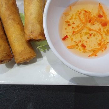 Pho Cafe - a bowl of soup and three spring rolls - Vietnamese Near Me - Louisville, Kentucky