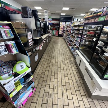 7-Eleven - a grocery store aisle with a variety of products - Coffee & Tea Near Me - Oakton, Virginia 7-Eleven - a grocery store aisle with a variety of products - Coffee & Tea Near Me - Oakton, Virginia