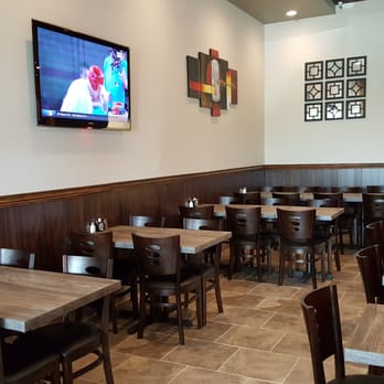 Wild Ginger Asian Bistro - The dining room they also have a nice size TV - Asian Fusion Near Me - Gilbert, Arizona Wild Ginger Asian Bistro - The dining room they also have a nice size TV - Asian Fusion Near Me - Gilbert, Arizona