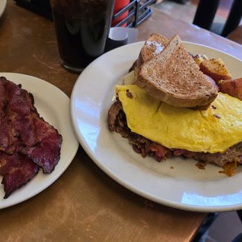 Jake's Restaurant - Thick cut bacon. Omelet with bacon and sausage and side of roasted potatoes. Sausage stole the show as mouth watering and well seasoned. - Breakfast & Brunch Near Me - Northampton, Massachusetts