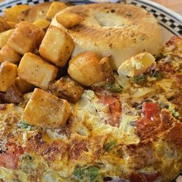 Make my own 3 egg omlet, everything bagel and kitchen fryes.
