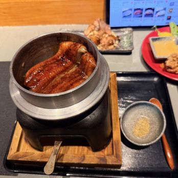 Sakaki Izakaya - Eel Kamameshi (cast iron rice dish) - Sushi Bars Near Me - Arlington, Virginia Sakaki Izakaya - Eel Kamameshi (cast iron rice dish) - Sushi Bars Near Me - Arlington, Virginia