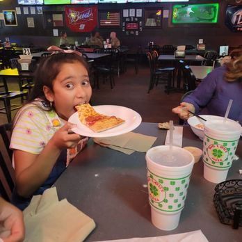 Big Lou's Pizza - Geny having a slice of pepperoni pizza - Pizza Near Me - San Antonio, Texas Big Lou's Pizza - Geny having a slice of pepperoni pizza - Pizza Near Me - San Antonio, Texas