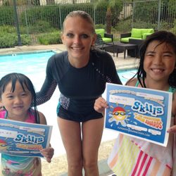 Sunsational Swim School - Home Swim Lessons - Kids swim lessons - students receive certificate of completion after finishing their swim program