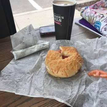 Bruegger's Bagels - Smoked Salmon on an Asiago bagel with a pickle and French toast flavor coffee - Breakfast & Brunch Near Me - Bloomfield Hills, Michigan