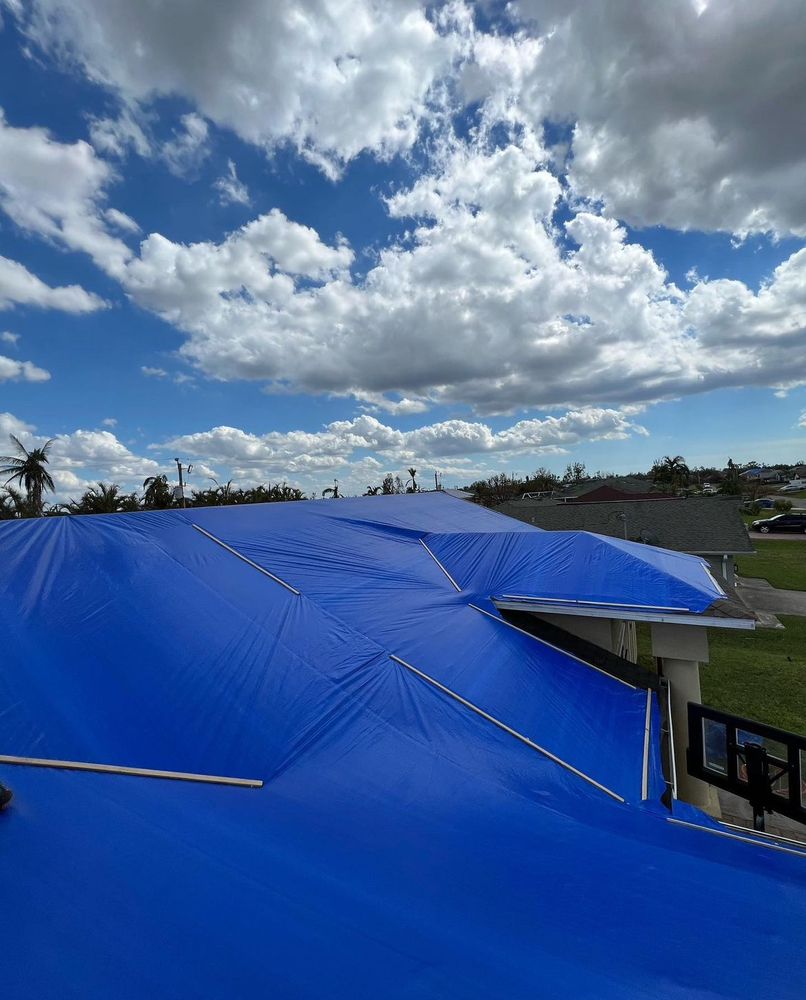 Slide of 305 Roof Tarps