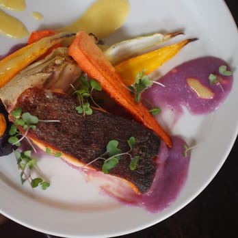The Heatley - a plate of food on a table - Pubs Near Me - Vancouver, British Columbia The Heatley - a plate of food on a table - Pubs Near Me - Vancouver, British Columbia