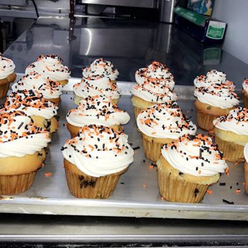 Michael's Bakery and Cafe - cupcakes with white frosting and sprinkles - Bakeries Near Me - Methuen, Massachusetts