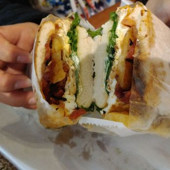Cafecito - The Espana special: had chorizo, marinated onions, potato, egg, lettuce, and bacon - Coffee & Tea Near Me - Chicago, Illinois Cafecito - The Espana special: had chorizo, marinated onions, potato, egg, lettuce, and bacon - Coffee & Tea Near Me - Chicago, Illinois