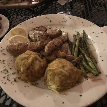 Penny Black - Crab cake platter with grilled asparagus and fingerling potatoes - Bars Near Me - Baltimore, Maryland Penny Black - Crab cake platter with grilled asparagus and fingerling potatoes - Bars Near Me - Baltimore, Maryland